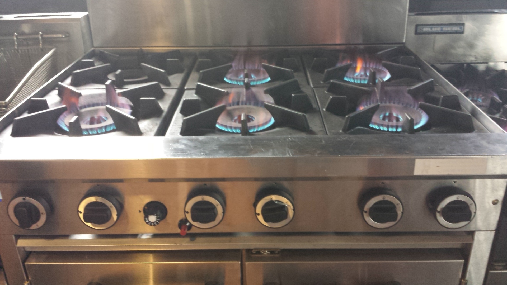 Commercial kitchen gas stove installation by certifying Gasfitters